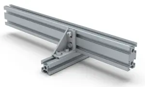 Aluminiowy kątownik uniwersalny łączy dwie profilowane szyny, tworząc stabilną konstrukcję.