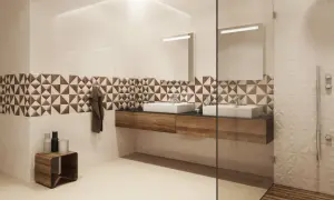 Jasne płytki i geometryczny wzór na ścianie optycznie powiększą płytki do małej łazienki.