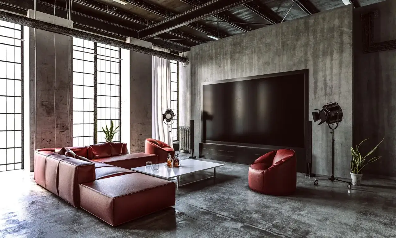 Nowoczesny salon z betonem architektonicznym. Czym pomalować beton? Tutaj ściany są surowe, a meble w intensywnym kolorze.