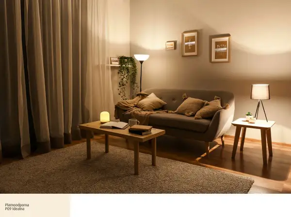 Przytulny salon z kanapą, stolikiem i dywanem. Ciepłe kolory ścian do salonu tworzą relaksującą atmosferę.